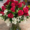 A classic long stem roses with baby breaths and greenery

$150 (2 dozen)