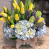 This glass cube with spring bloom, includes hydrangeas, hyacinths and tulips.

We advise