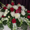 This beautiful red and white casket piece is a very elegant and