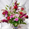 This beautiful arrangement features, red roses, stargazer lilies, stock, pink carnations, lavender