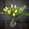 We LOVE this vintage glass vase that showcases the tulips and simple