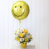 Light up someone&rsquo;s life with this bright yellow smiley face cache pot