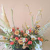 This massive arrangement is sure to make a statement! Please note that