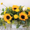 This Sunny arrangement is full of sunshine and is sure to brighten
