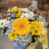 White Daisies are included in this beautiful spring design including Hydrangeas, Gerber's