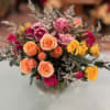 Our 6 in bubble bowl is filled with assorted colored spray roses.