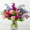 Bursting with exquisite colors and voluminous texture, the Breezy Meadows Bouquet brings