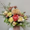 This enchanting Valentine's Day arrangement is a beautiful blend of soft pastels