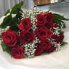 Send this one dozen red rose bouquet for every special occasion. From