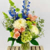 A One-Sided Arrangement. Light, refreshing colors reminiscent of a gentle coastal breeze.