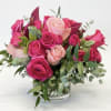 This stunning arrangement is all shades of pink and all high-end flowers.