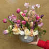 Dainty arrangement comprised of the most majestic blooms, emphasizing tuips and sweet