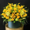 Brighten any space with vibrant yellow roses, spray roses, kiwi green hydrangeas