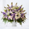 Eirene is a graceful funeral service arrangement designed to bring comfort and