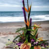 Take a trip to paradise with a tropical floral arrangement! The flowers