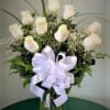 A classic dozen of our finest white roses are truly the height
