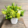 A beautiful spring arrangement of bright greens and yellows!