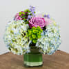 Hydrangea, Roses, Spider Mums, Euphorbia, Hyacinths. Flowers and containers availability is depending