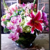 A mix of flowers from around the world.  Orchids, Hydrangea, tulips