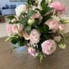 Gorgeous soft pink ranunculus with lovely garden roses and lisianthus blooms combine