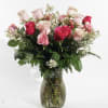 This is a dozen and a half assorted pink roses in a