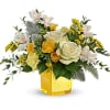 This sunny gift includes white roses, yellow spray roses, light pink alstroemeria