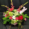 Adorable basket and bunny accent for your large centerpiece of Easter flowers.