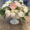 Soft pinks, blush and white hues create an arrangement for any occasion.