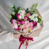 Brighten someone's day with this beautiful hand-tied bouquet. Featuring elegant pink roses