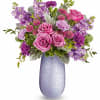 Capture her heart with Teleflora's Vivi vase, crafted from hand-blown art glass