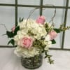 This bouquet is simple - White Hydrangeas with an accent of timeless