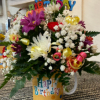 Time to celebrate with this super fun arrangement designed in a "Happy