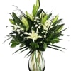 With Loving Thoughts is a serene sympathy arrangement designed to express care