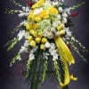 Share your feelings with this bountiful, full standing spray of sympathy flowers.