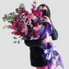 Send this beautiful designer's choice grand purple bouquet today to show them
