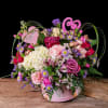 An assortment of multicolored soft florals in a pastel hatbox, fit for