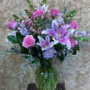 A lovely bouquet of Pink Roses, Pink Lilis, Pink Snap Dragons, Pink