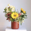 Earthy yet refined, our "Sweet and Sunny" floral arrangement for a radiant