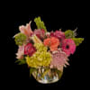 A bowl full of seasonal flowers!! Sure to delight anyone!  A
