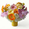 Beautiful yellow and white bouquet filled with roses orchids hydrangeas lilies and