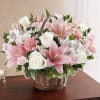 Honor the memory of a loved one with this peaceful basket of