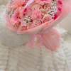 A soft and elegant bouquet bursting with blush pink gerberas, roses, carnations