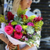 Laura is a beautiful bouquet with roses and succulents. This bright bouquet