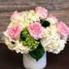 This stunning arrangement will put a smile on anyone! 
It's filled with