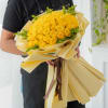 A radiant bouquet featuring 36 elegant Yellow roses, beautifully complemented by cheerful