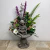 Our fairy garden bouquet is actually a small birdbath filled with freshly