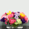 A luxurious and bright mix of premium blooms that are guaranteed to