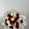 Elegant bouquet with red and white roses that intertwine creating a harmonious