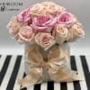 This adorable Arrangement is presented in a white hat box with gold