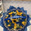 mixed blue roses and sunflowers 